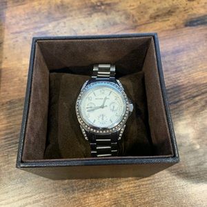 Silver Michael Kors watch with extra links